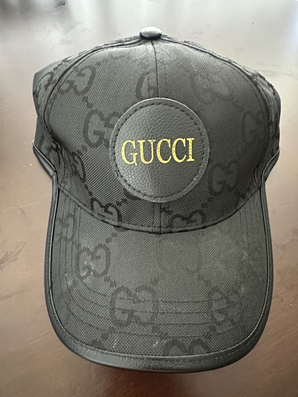 Black Cap with Gold Logo Patch